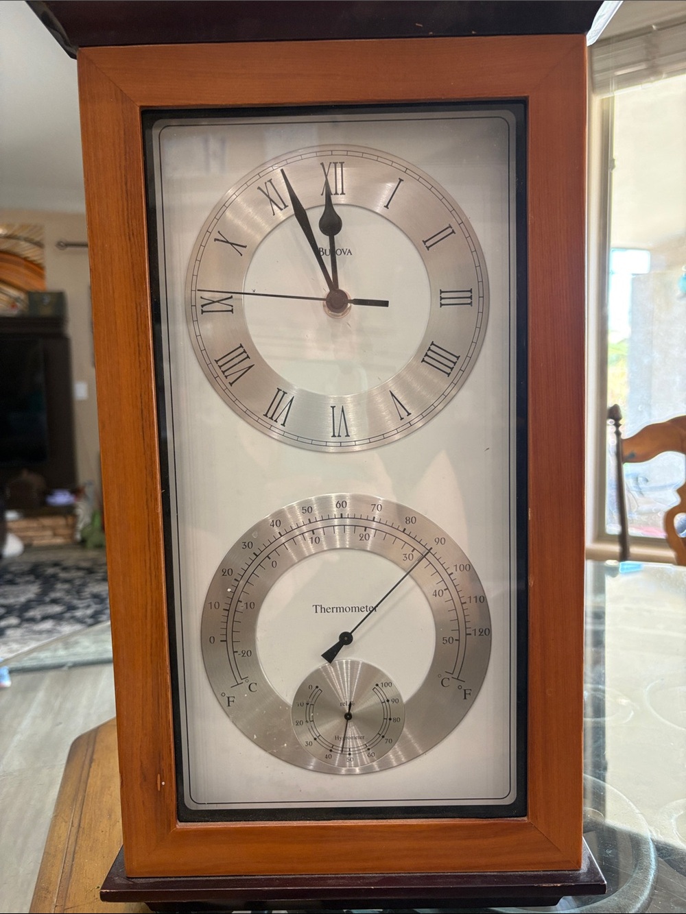 Bulova C3760 Wood-Frame Wall Clock in Brown and Silver